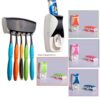 TOOTHPASTE SQUEEZING DEVICE WITH BRUSH HOLDER